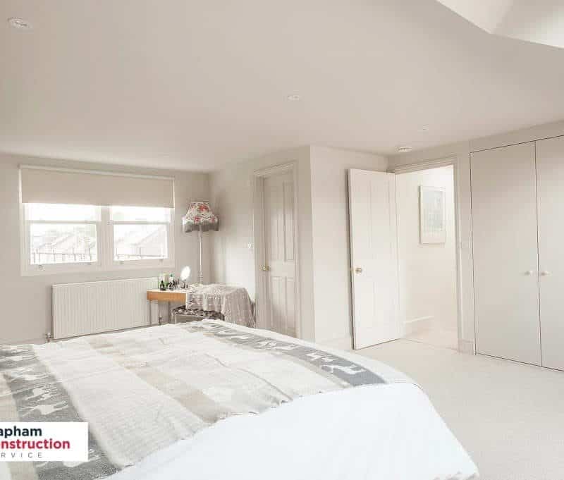 completed loft extension master bedroom all white fitted wardrobes