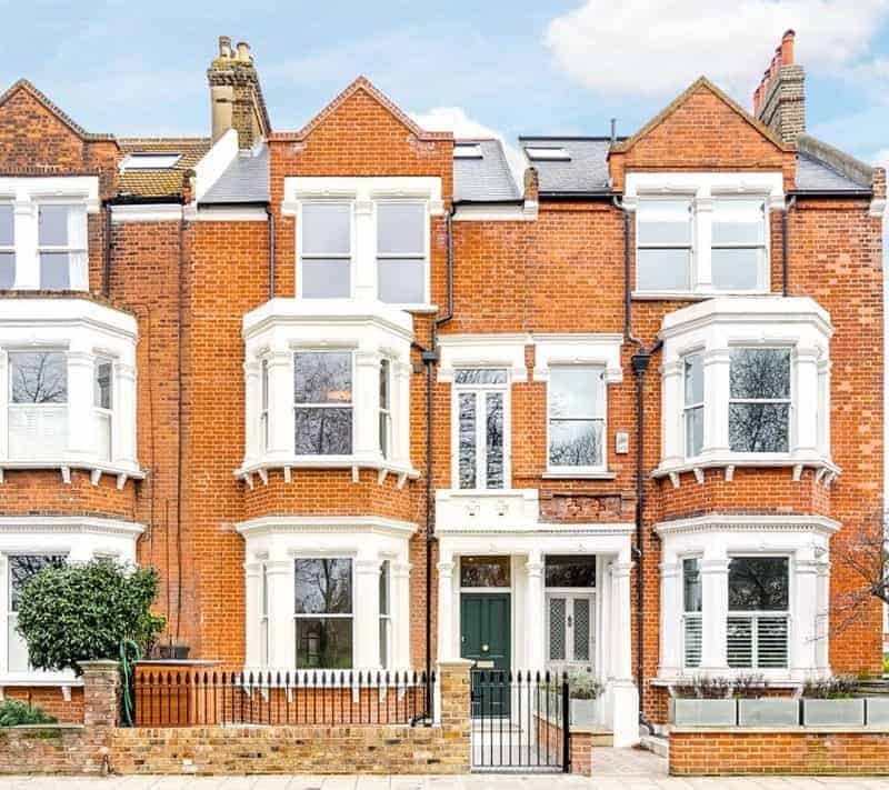 outside view of loft extension and home extension brick and white