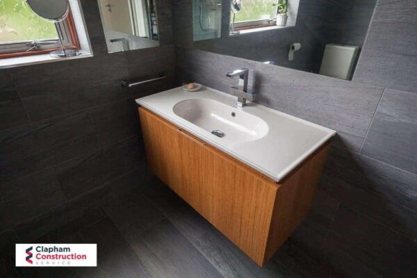 colliton-loft-conversion-dark-bathroom-1 open planned kitchen home extension with sky light